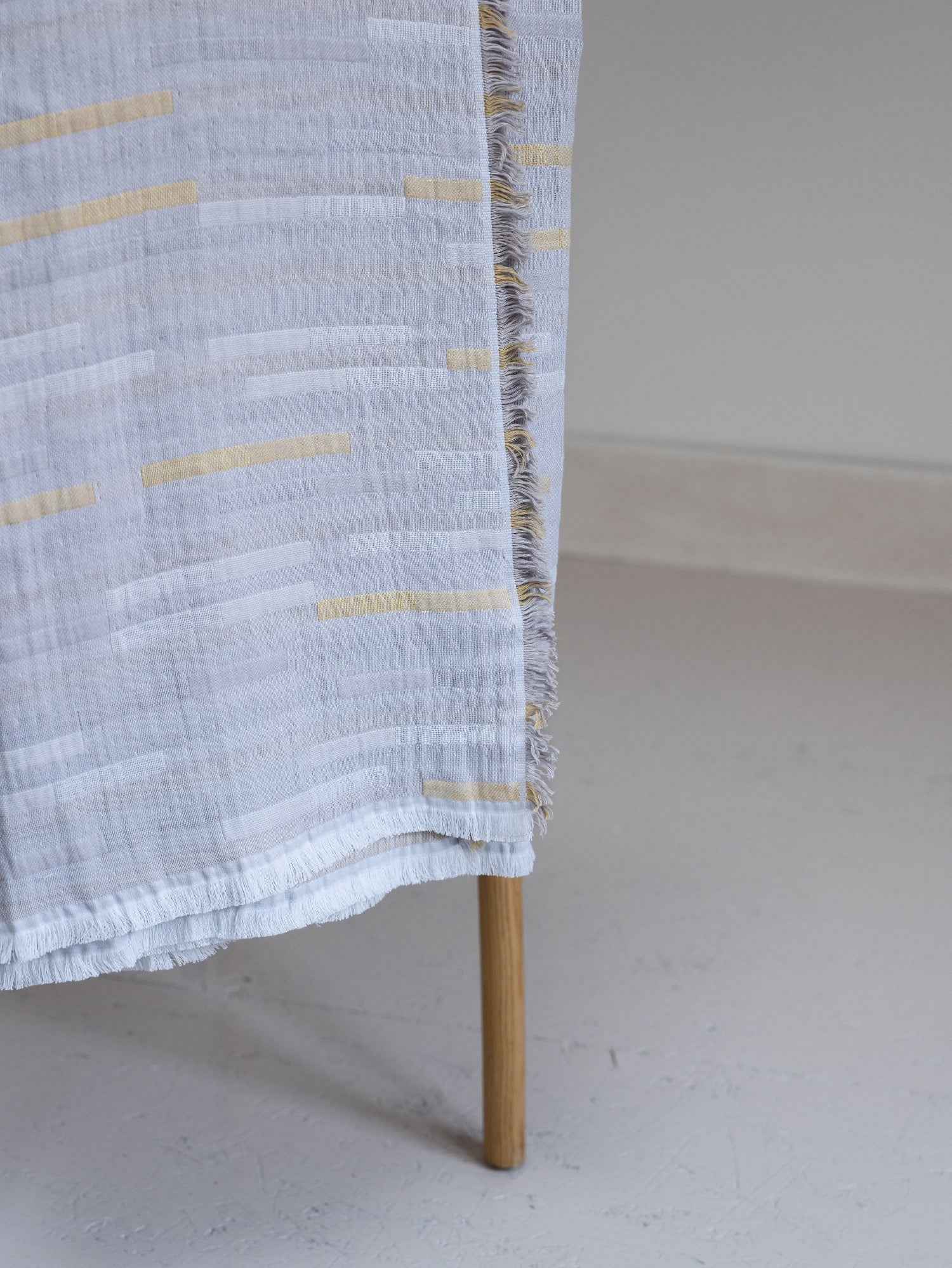 Grey and yellow cotton throw blanket