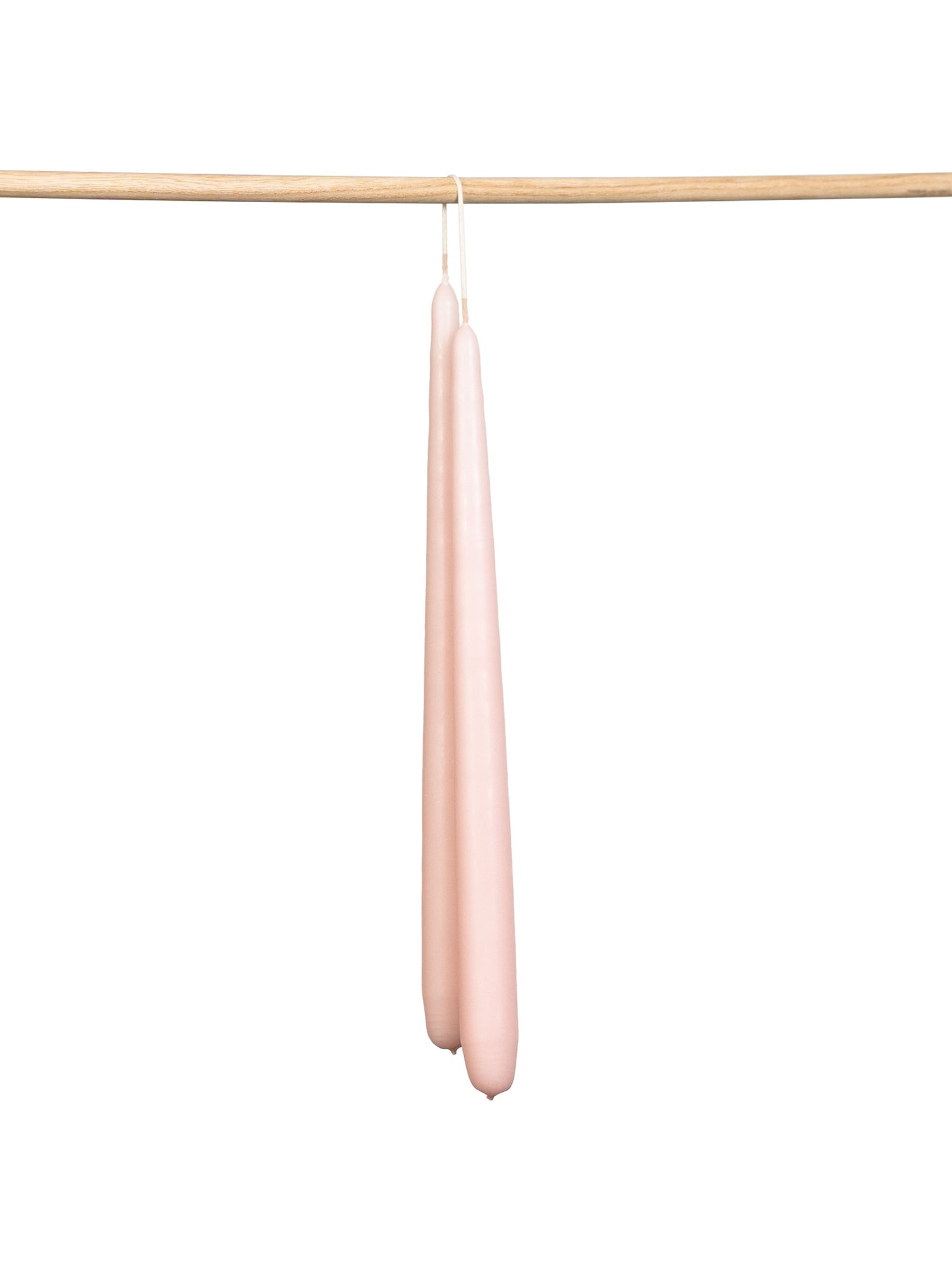 Tapered hand dipped dinner candles 28cm in pink