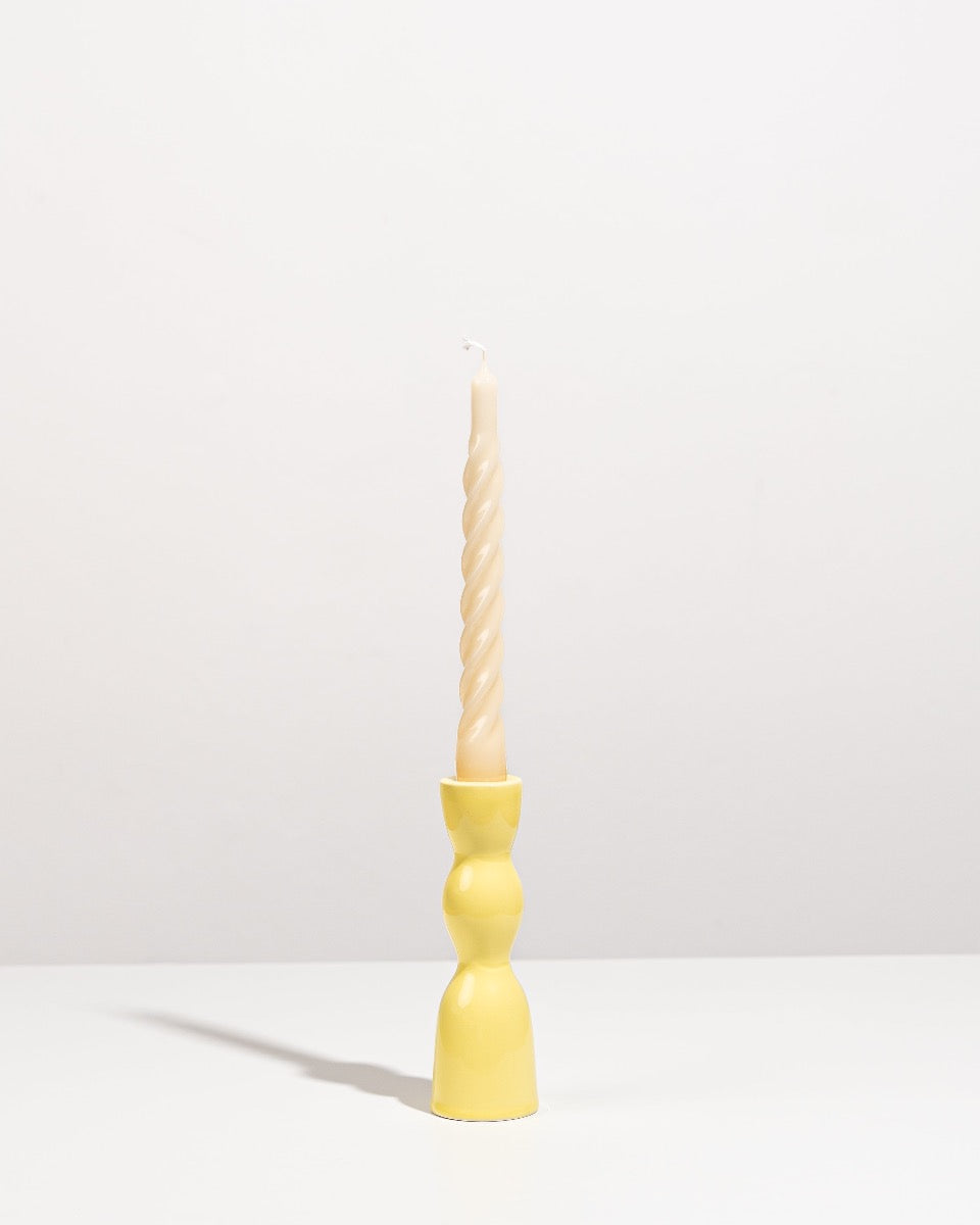 low yellow candleholder 