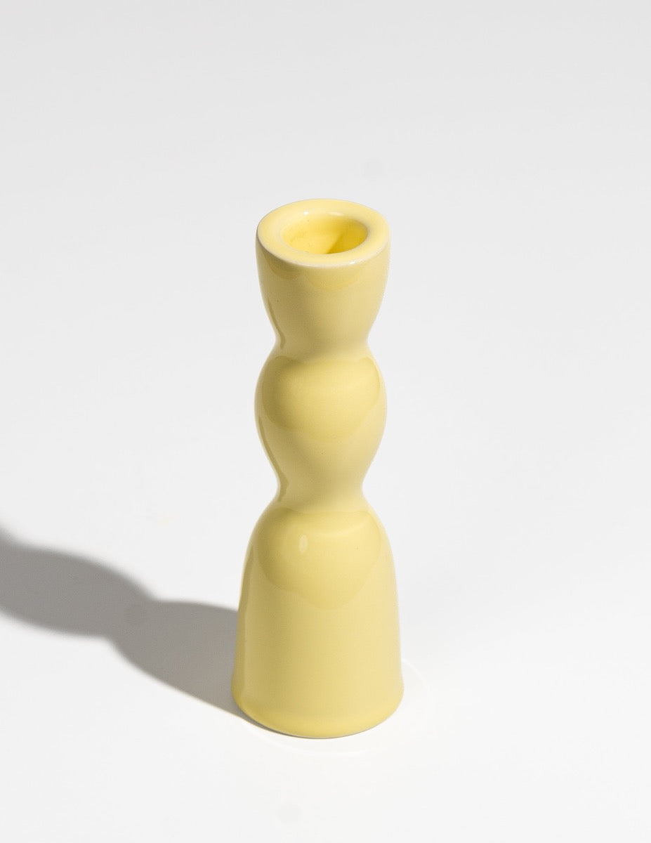 low yellow candleholder 