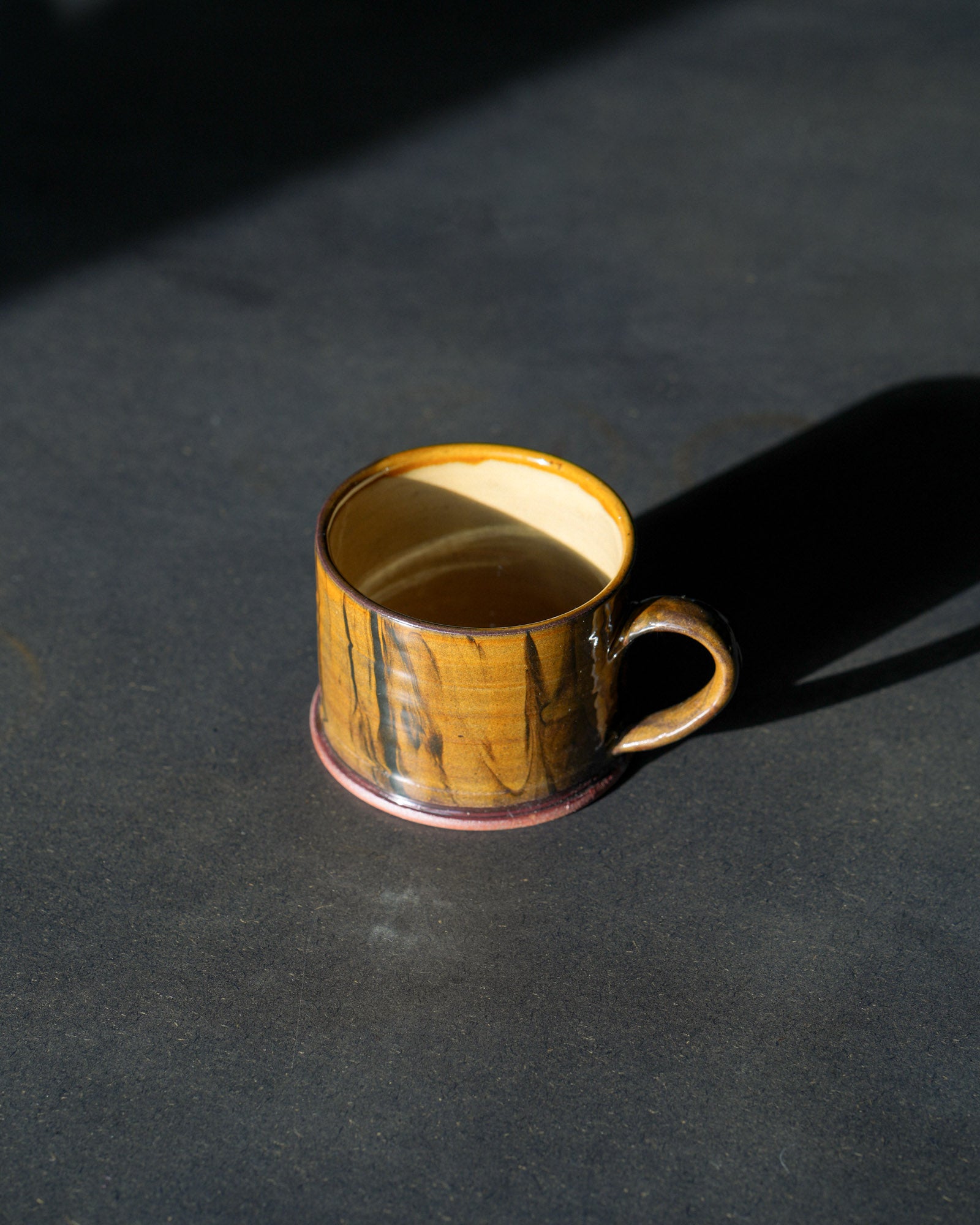 Rob Towler hand thrown yellow ceramic mug made in the uk