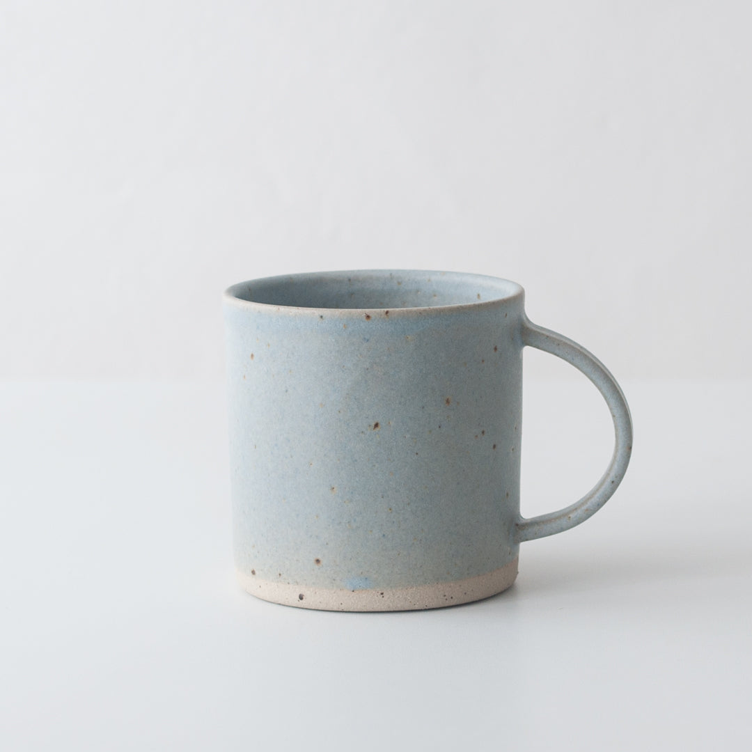 Light blue hand thrown ceramic stoneware mug by Dor & Tan