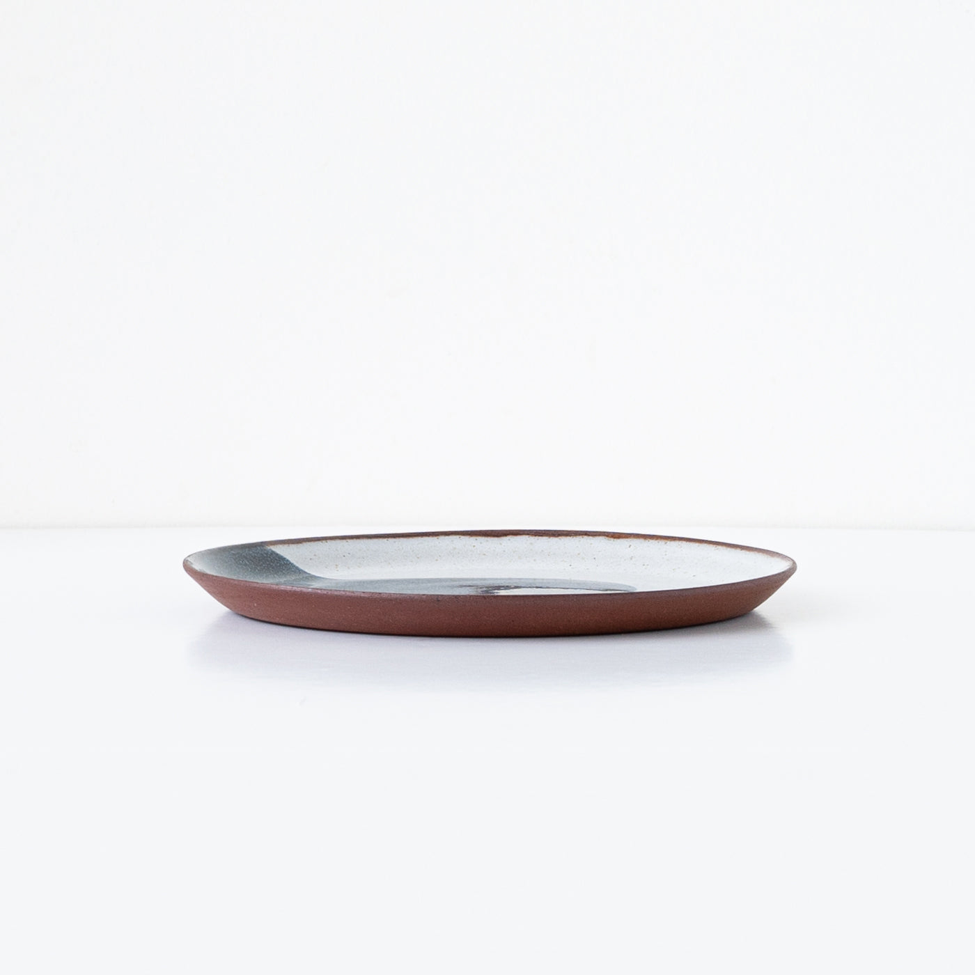 Silvia K handmade terracotta small plate with white and black decor