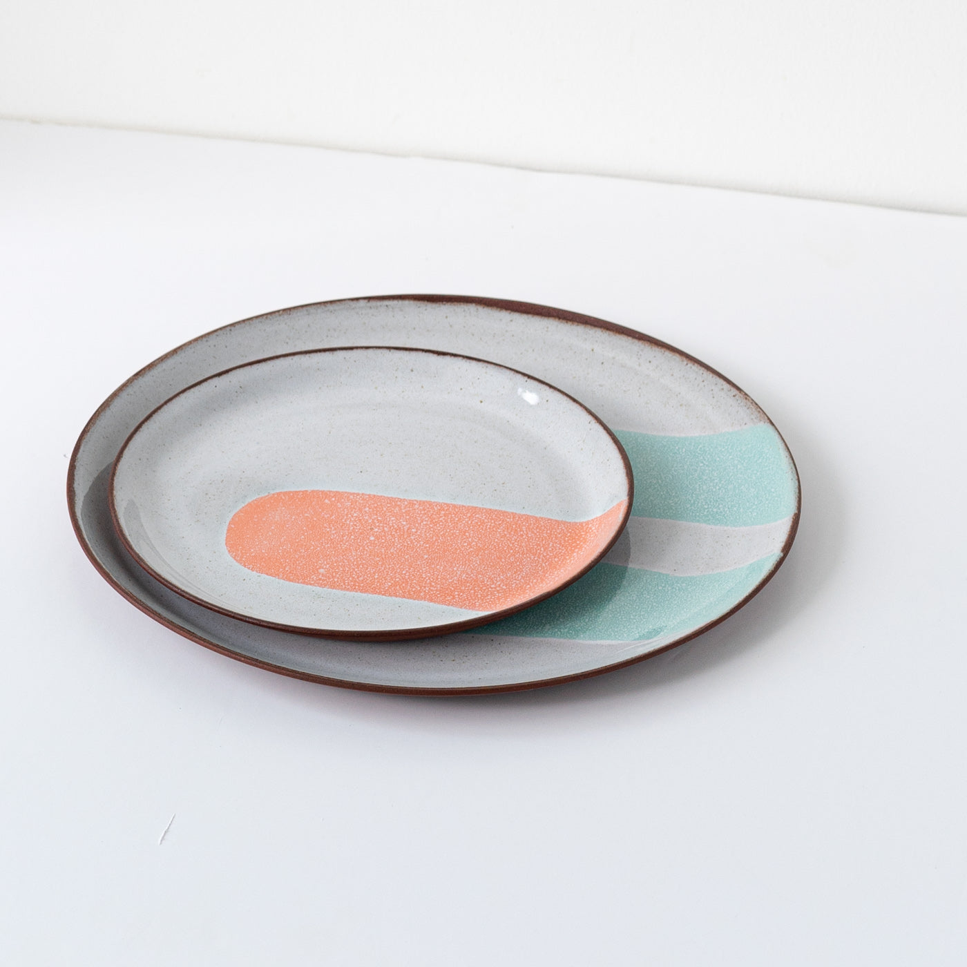 Silvia K hand made terracotta plate with white and 2 turquoise decor