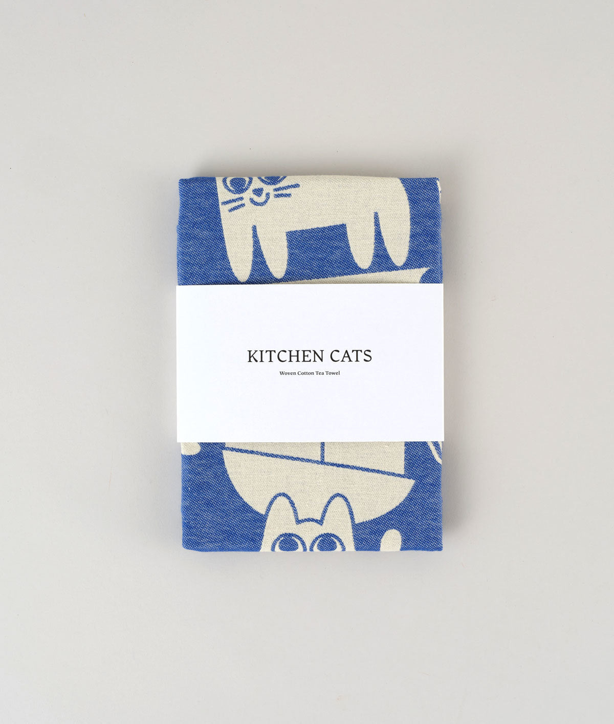 Blue and white cat illustrated tea towel by Elliott Kruszynski for Wrap Magazine