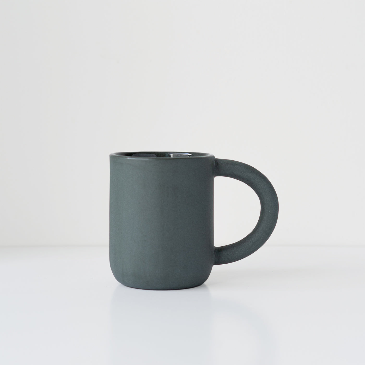 laureanne kootstra design hand made ceramic black porcelain mug