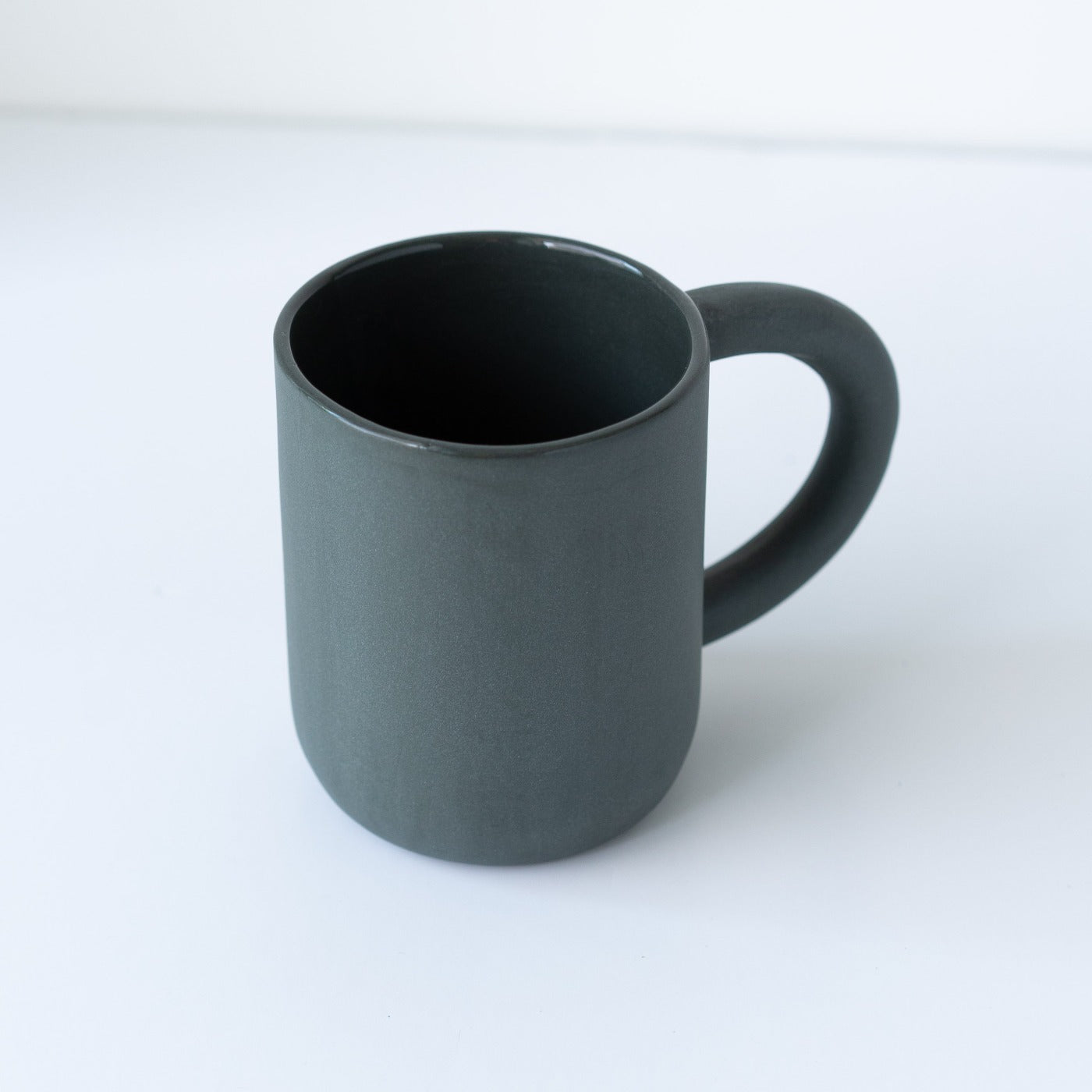 laureanne kootstra design hand made ceramic black porcelain mug
