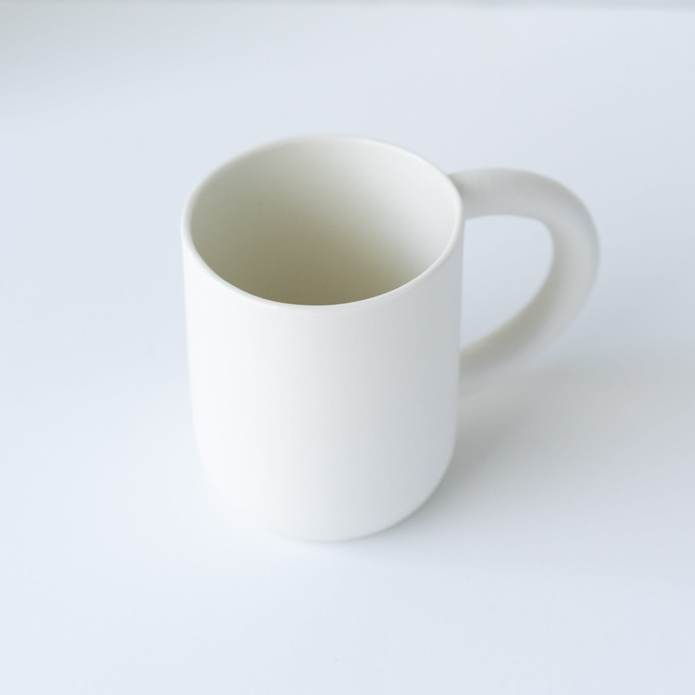 laureanne kootstra design hand made ceramic white porcelain mug