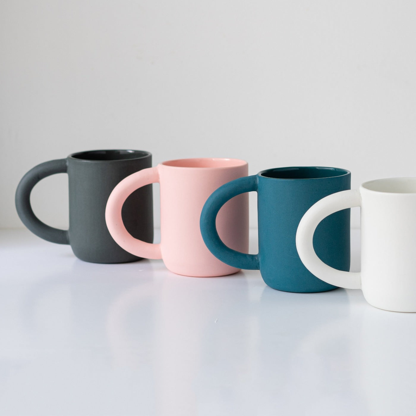 laureanne kootstra design hand made ceramic black porcelain mug