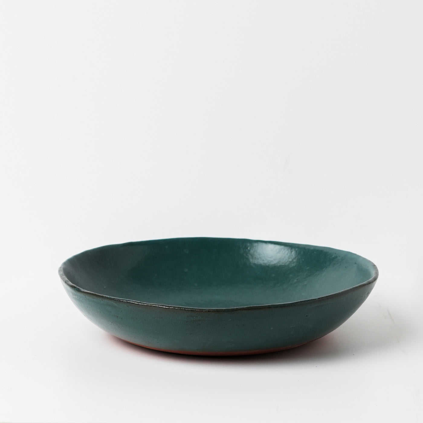 Emerald green hand thrown ceramic pasta bowl by Gaëlle Le Doledec