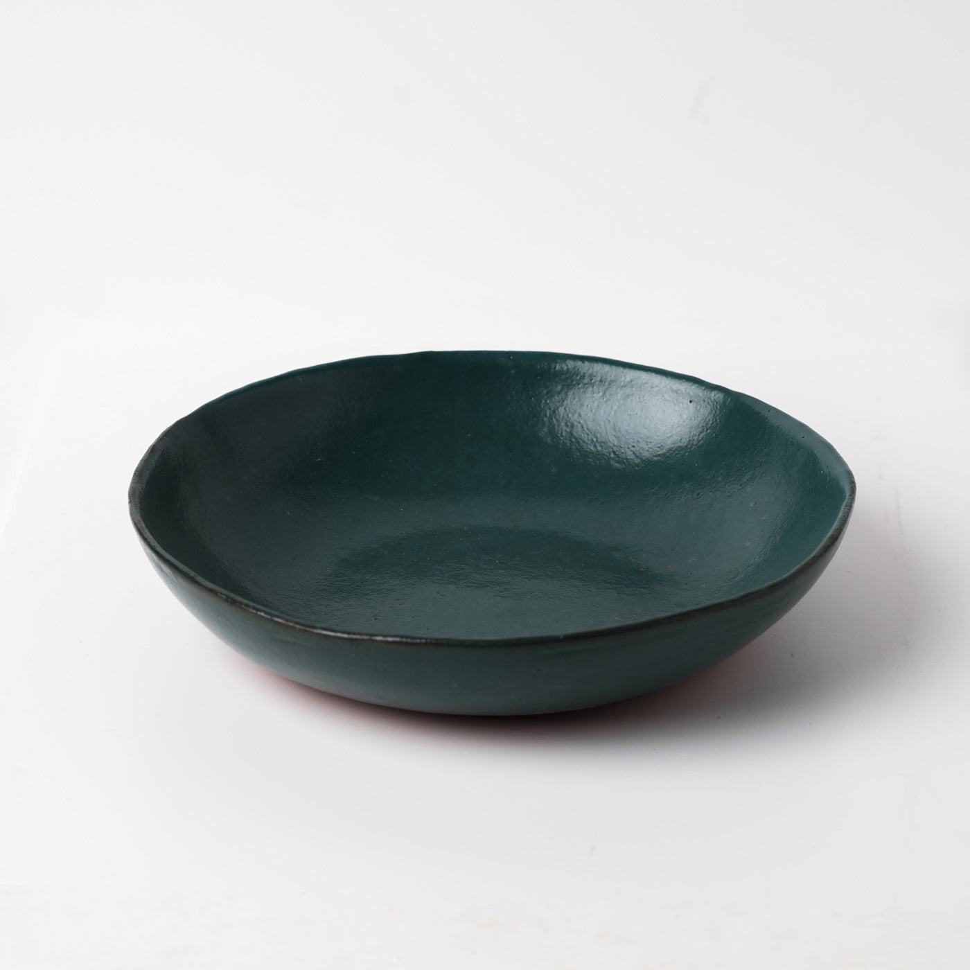 Emerald green hand thrown ceramic pasta bowl by Gaëlle Le Doledec