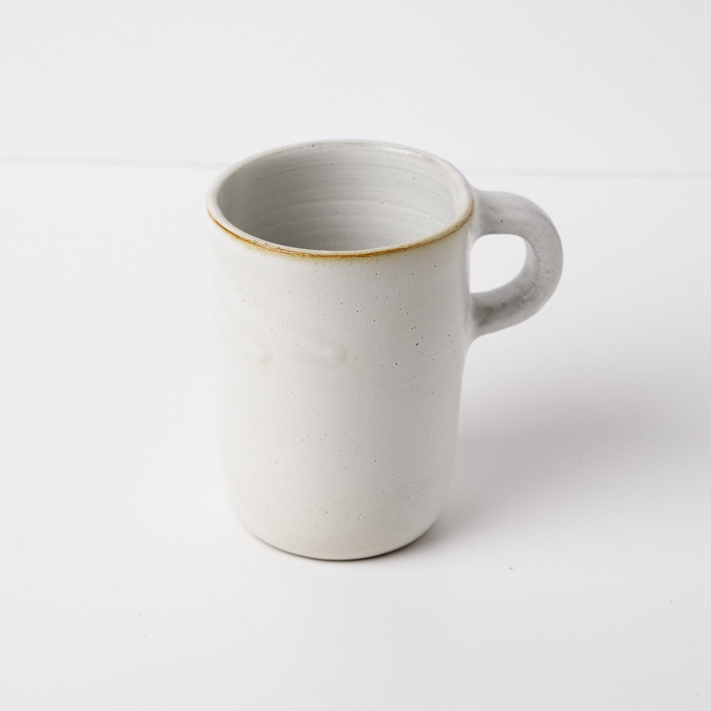 Ivory white ceramic mug by Gaëlle Le Doledec