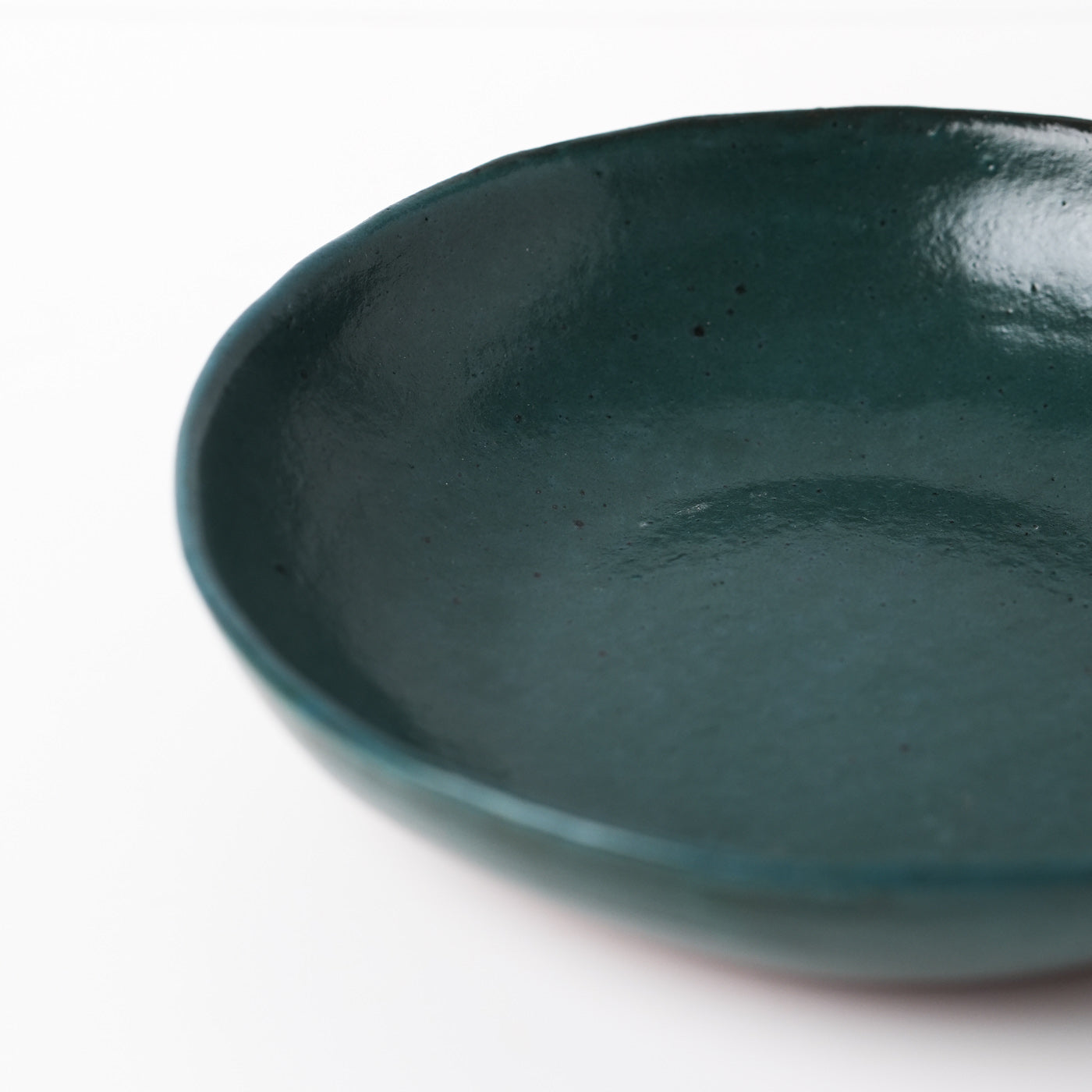 Emerald green hand thrown ceramic pasta bowl by Gaëlle Le Doledec