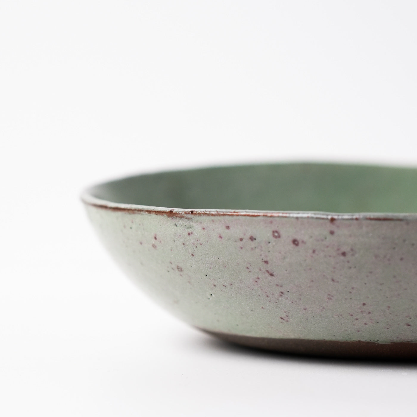 Green hand thrown ceramic pasta bowl by Gaëlle Le Doledec