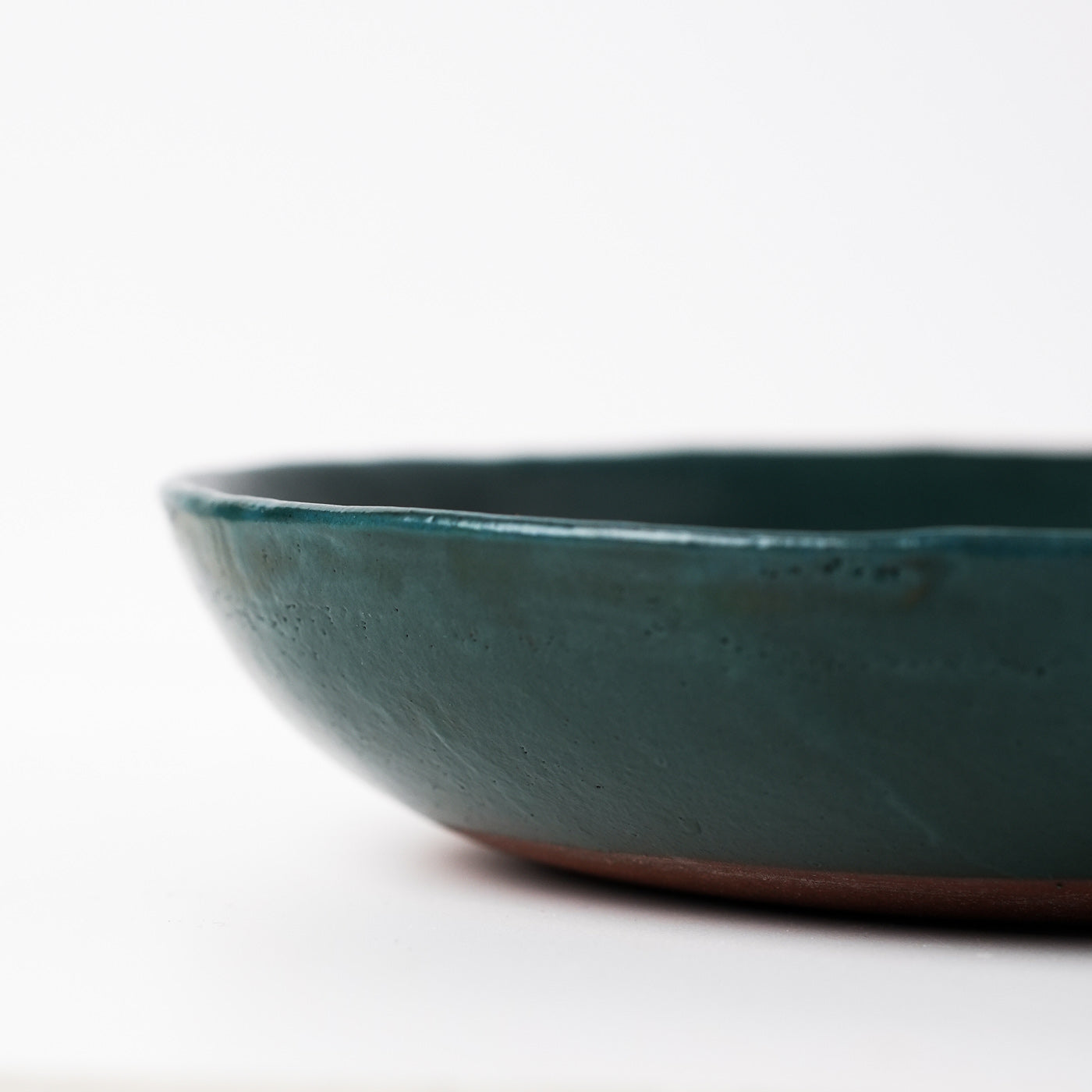 Emerald green hand thrown ceramic pasta bowl by Gaëlle Le Doledec