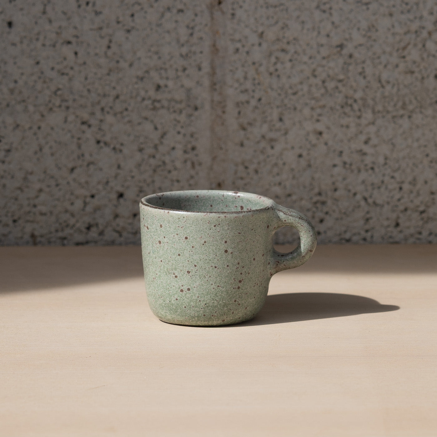 Green ceramic mug by Gaëlle Le Doledec