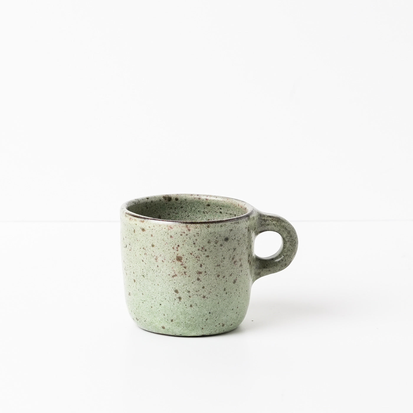 Green ceramic mug by Gaëlle Le Doledec