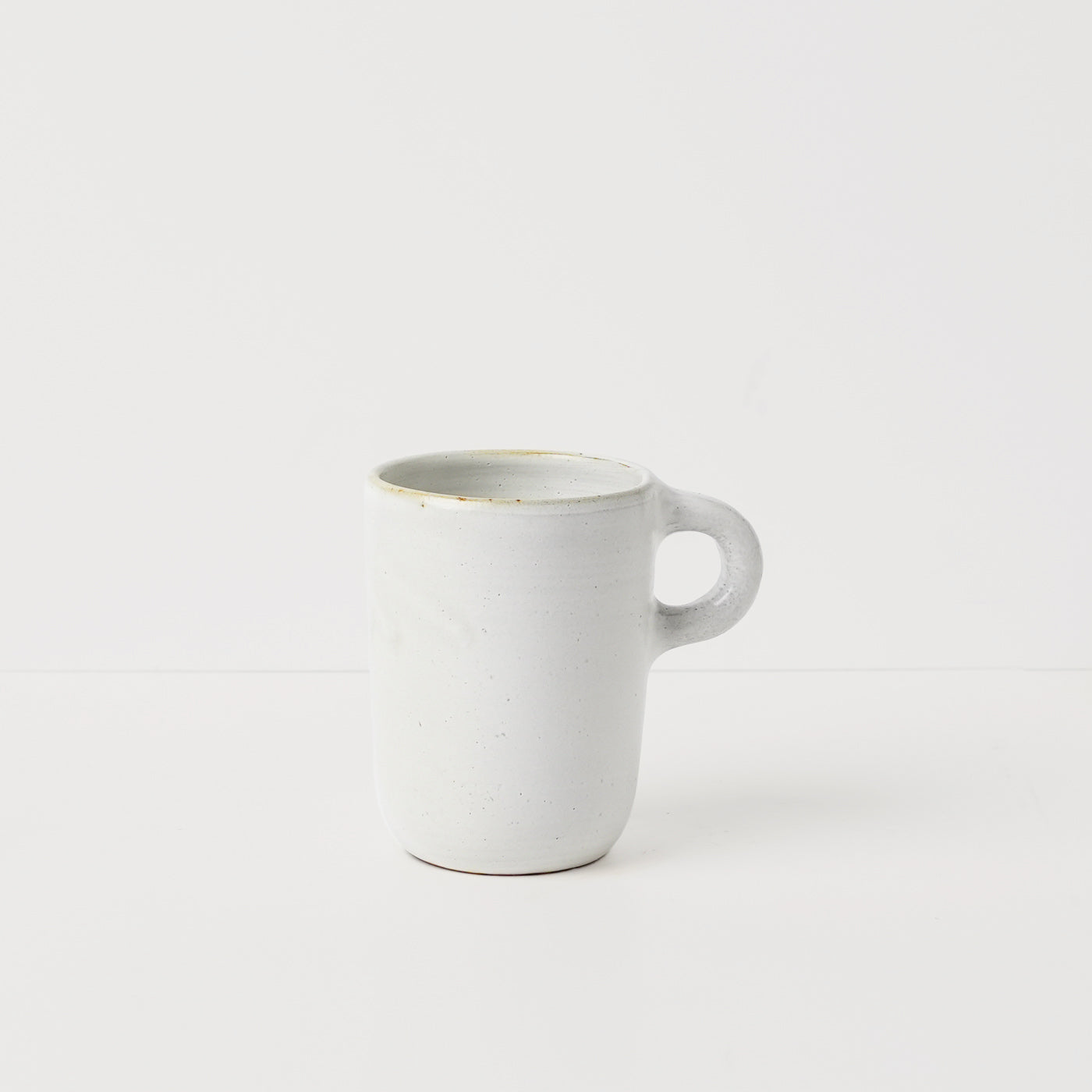 Ivory white ceramic mug by Gaëlle Le Doledec