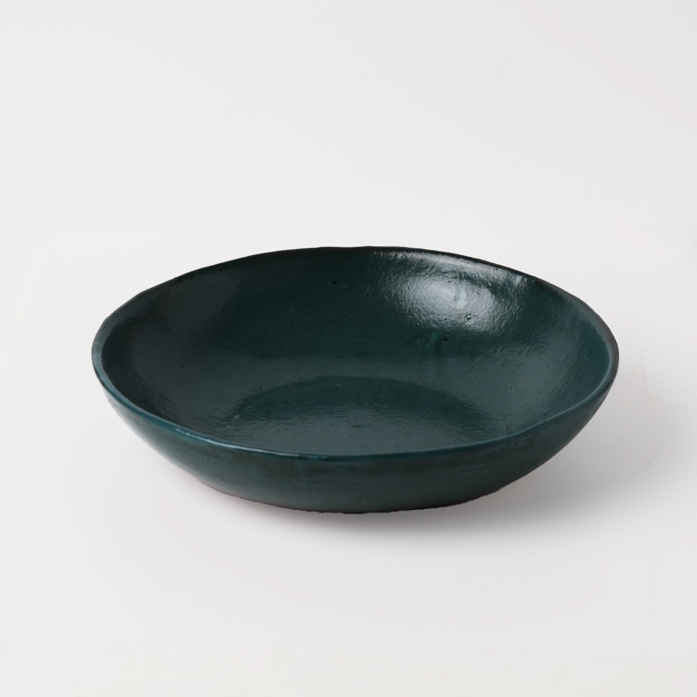 Emerald green hand thrown ceramic pasta bowl by Gaëlle Le Doledec